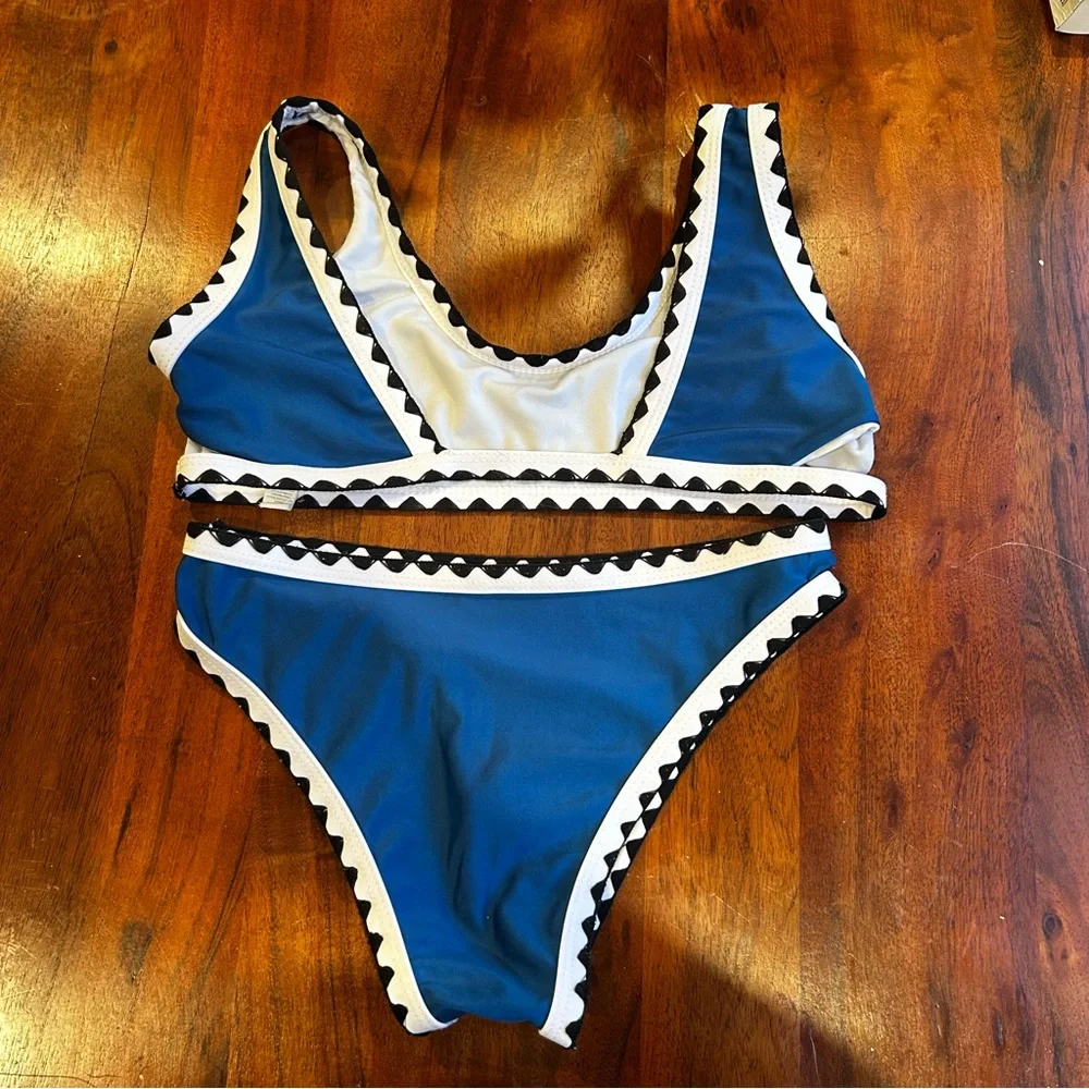 Blue and White Bikini Set with Black Trim. Size 11-13 years old 150cm.